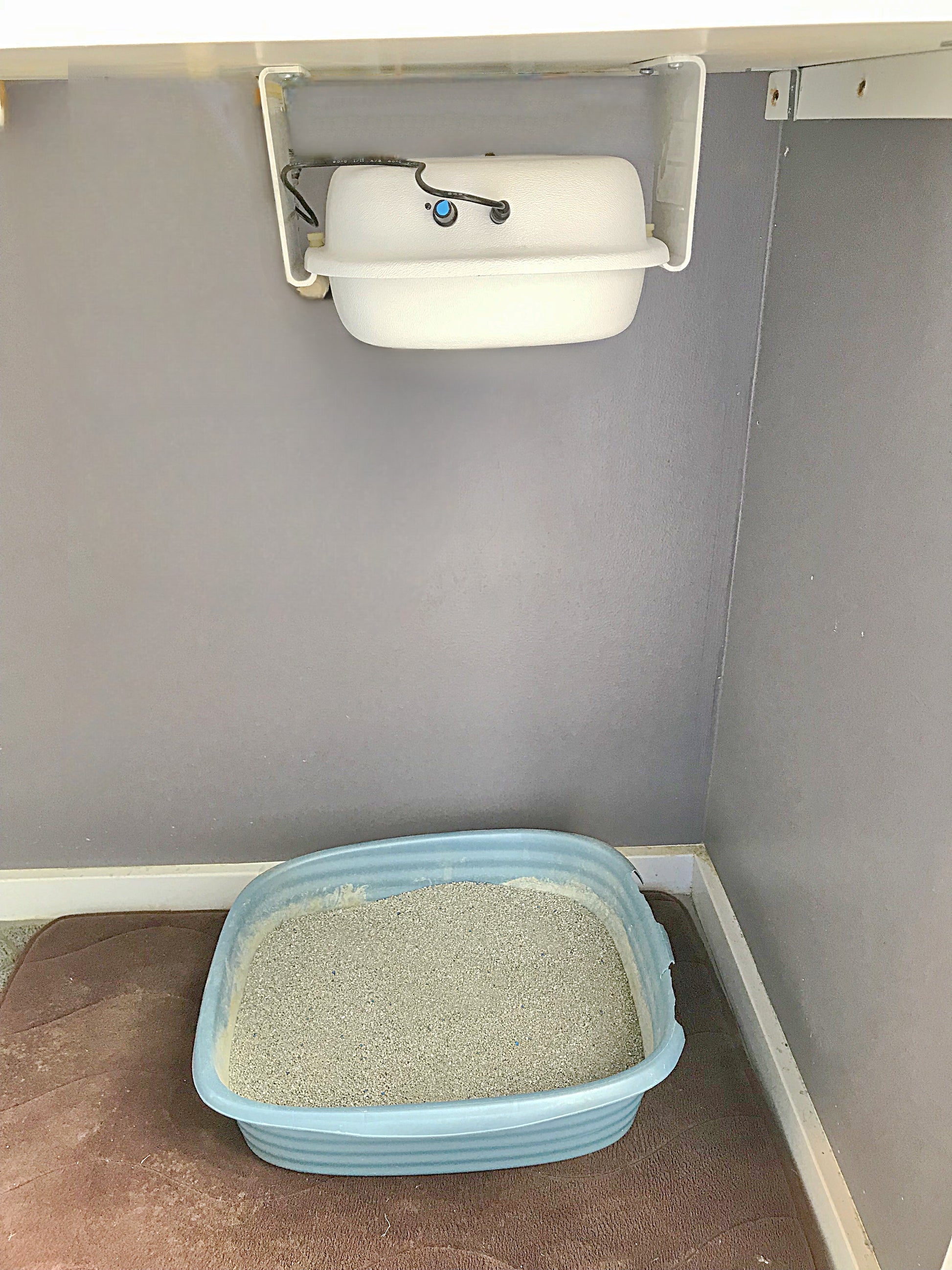 Purrified Air purifier mounted under counter